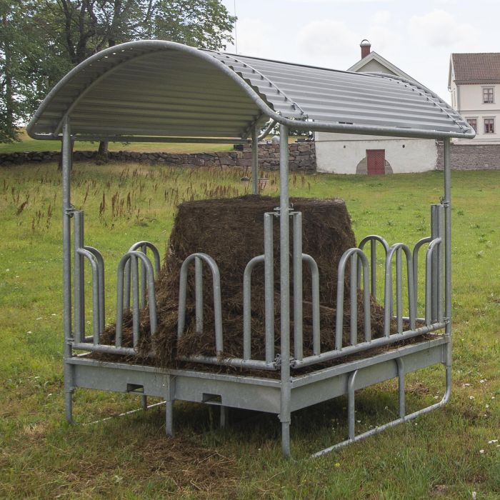 Feeder with tombstone railings, for cattle, 12 feed openings